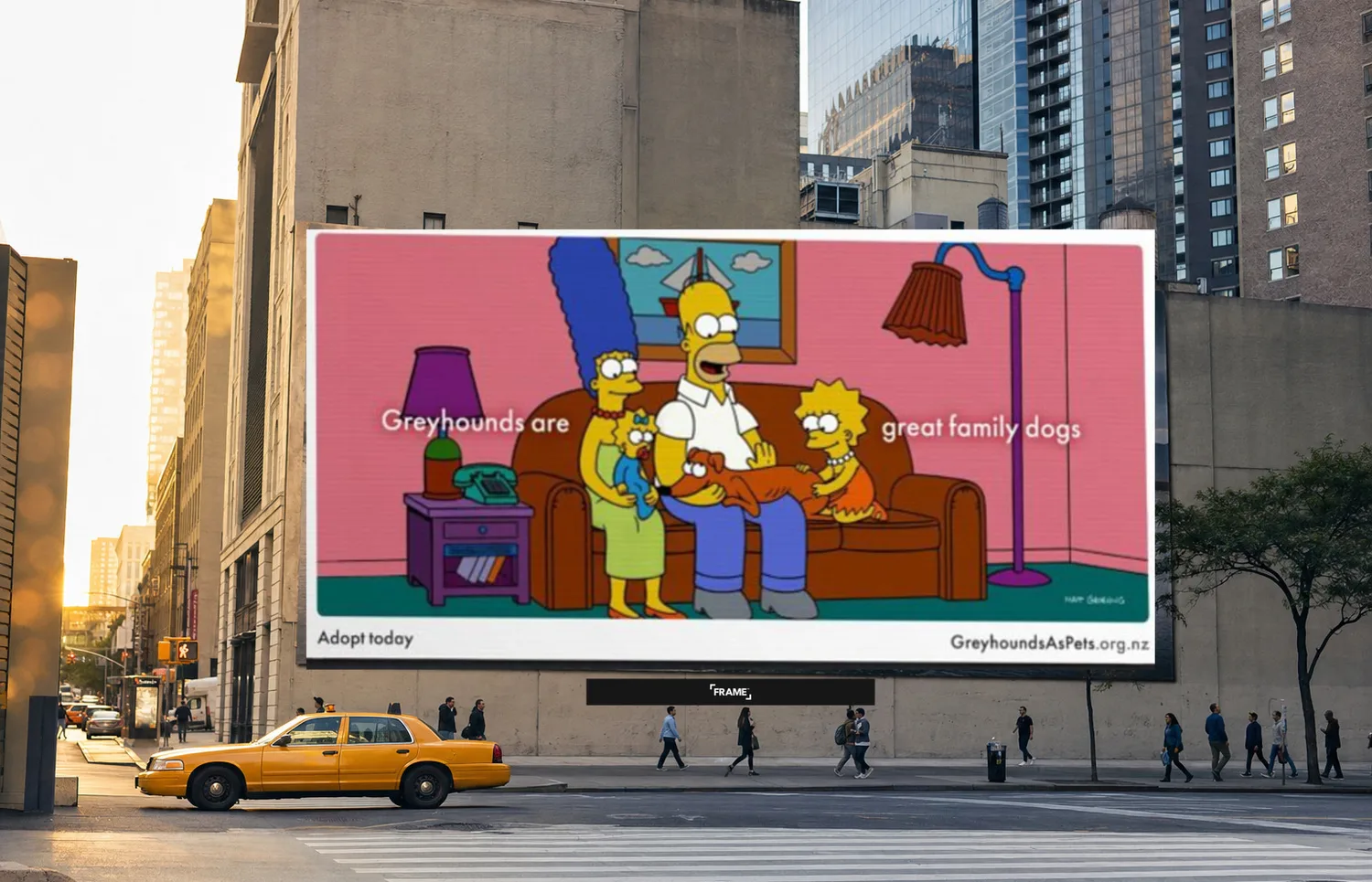 Greyhounds as Pets Simpsons creative on a downtown wallscape at golden hour, FRAME nameplate bottom-center